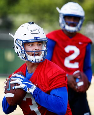 University of Memphis quarterback Brady White (left) during the first day of practice for the 2018-19 season.