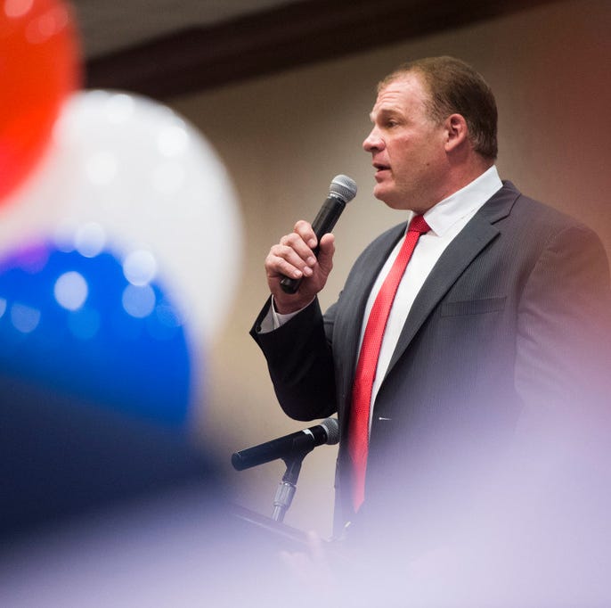 Republican Glenn Jacobs speaks to a crowd after early results showed him winning the mayoral race, Thursday, Aug. 2, 2018, in Knoxville, Tenn. Jacobs, who is also the WWE wrestler known as Kane, defeated Democrat Linda Haney. (Caitie McMekin/Knoxvill