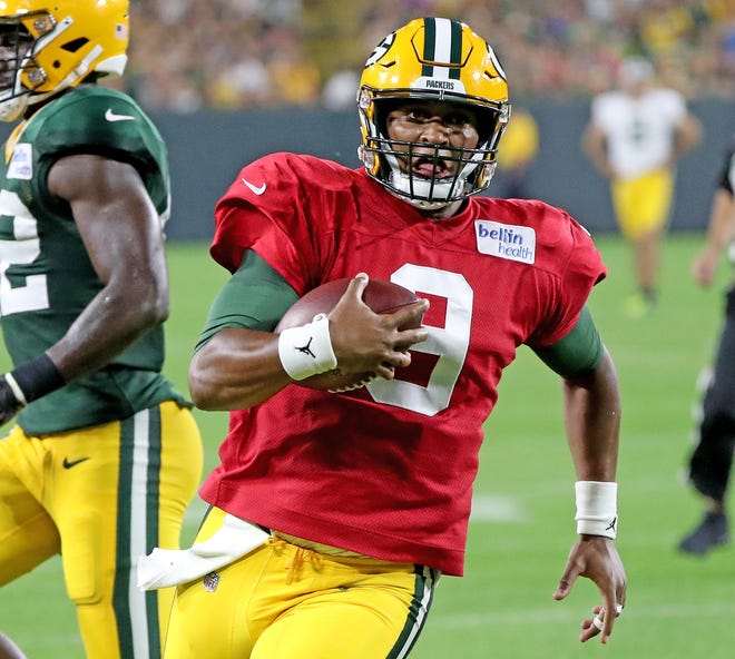 Green Bay Packers quarterback DeShone Kizer (9) runs to the goal line during Green Bay Packers Family Night  Saturday, August 4, 2018 at Lambeau Field in Green Bay, Wis.,