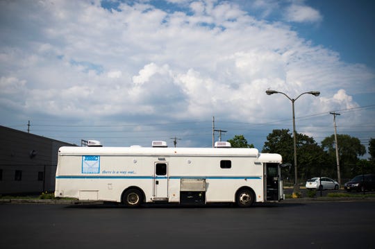 A mobile clinic from The John Brooks Recovery Center is parked outside the Pleasantville, N.J. location Monday, Aug. 6, 2018. The bus is used to deliver methadone to prisoners.