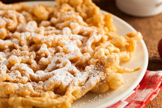 Homemade Funnel Cake with Powdered Sugar at the Fair
