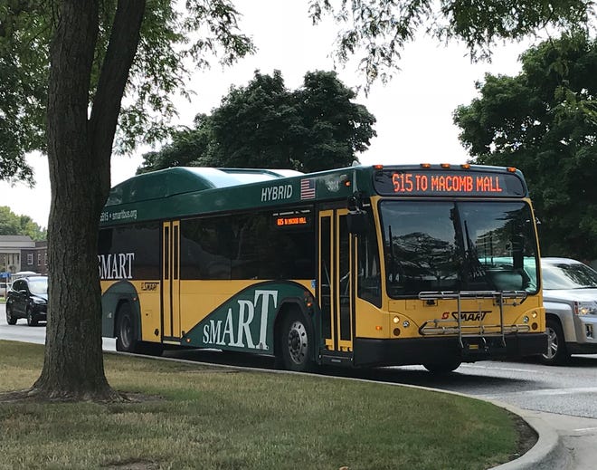 A Suburban Mobility Authority for Regional Transportation or SMART bus in traffic in St. Clair Shores on Aug. 7, 2018.