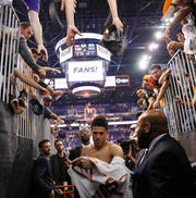 Phoenix Suns guard Devin Booker (1) has quickly become a star in Arizona.