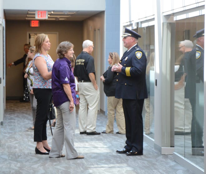 Deputy Chief Jim Grafton gives visitors a tour of the building.