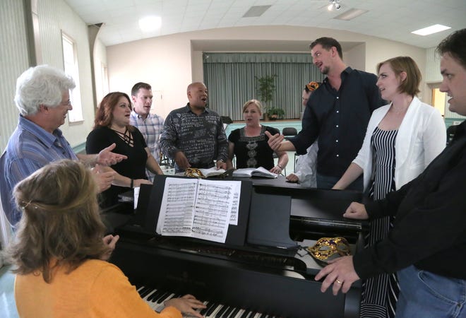 Members of the Mid-Ohio Opera rehearse inside the First Congregational Church on Wednesday for their performance of Un Ballo Maschera by Giuseppe Verdi.  