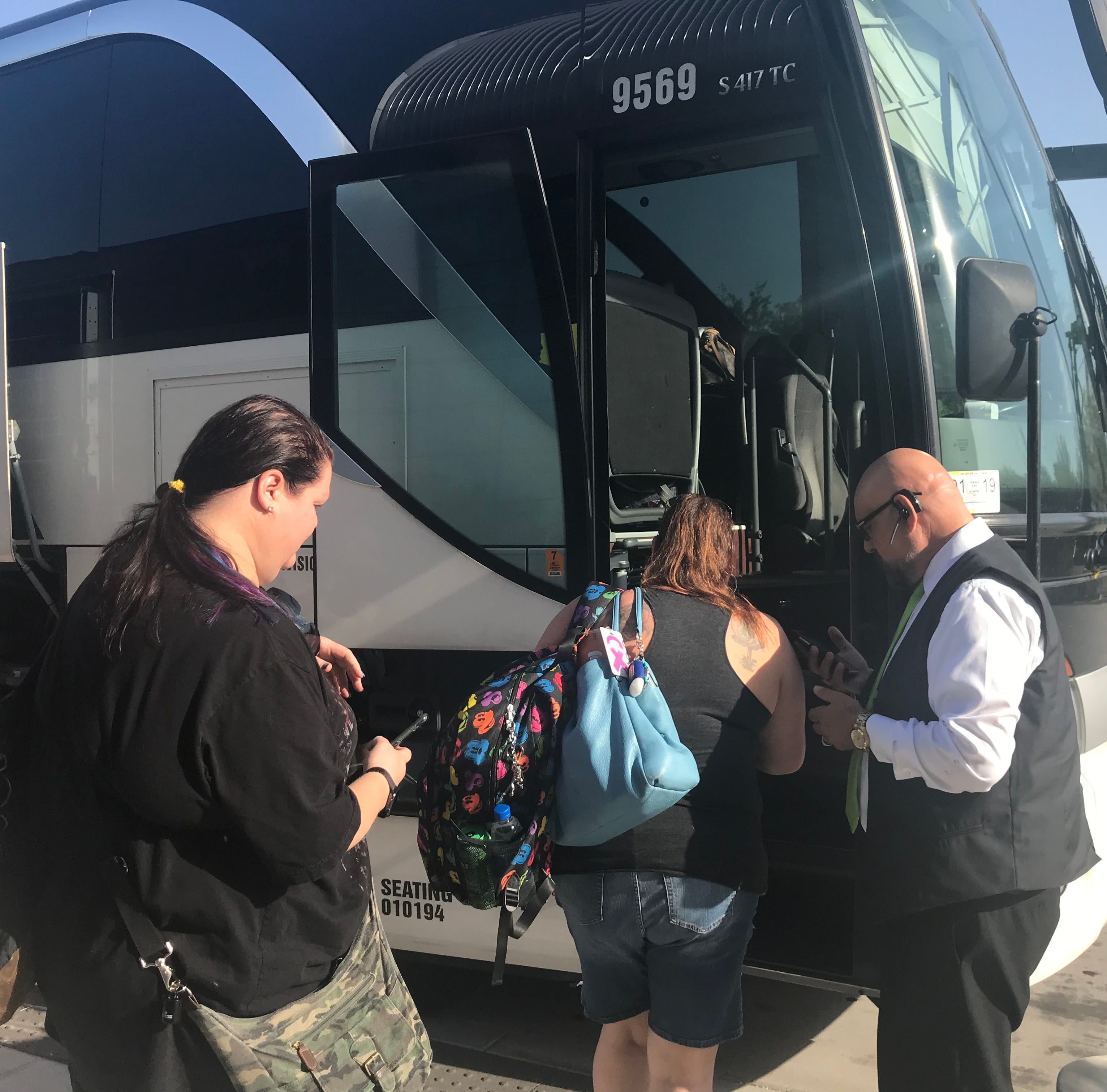 Passengers board a FlixBus at the Phoenix Sky Train Station near Phoenix Sky Harbor International Airport for a six-hour ride to Las Vegas. The buses are usually bright green but this was a last-minute substitution so the trip wasn't canceled.
