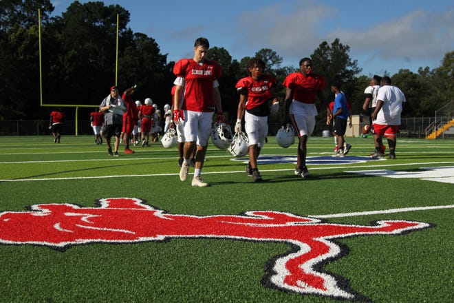 Leon's football team practices at Gene Cox Stadium on its new turf field on Tuesday, Aug. 7, 2018. Formerly Capital Stadium, Cox Stadium was dedicated to legendary Leon coach Gene Cox in 1997.