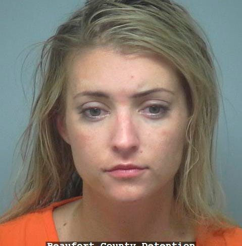 This photo provided by Beaufort County Detention Center shows Lauren Elizabeth Cutshaw.  Police in South Carolina say Cutshaw speed through a stop sign at 60 mph (97 kph) told officers there was no need to arrest her, because she's a 