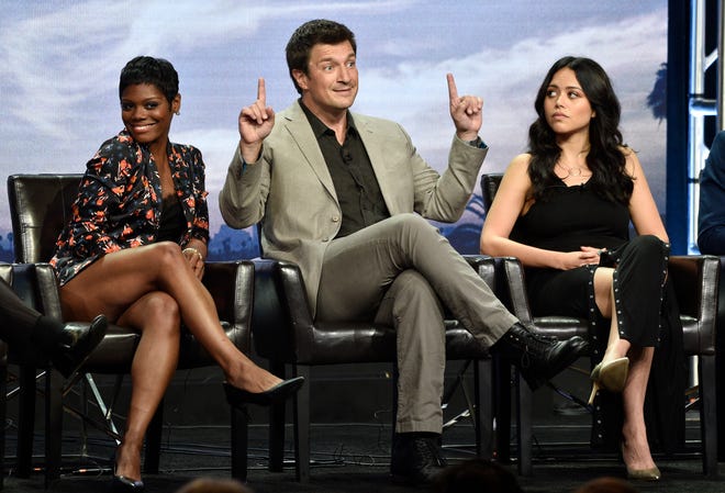 Afton Williamson, left, Nathan Fillion and Alyssa Diaz discuss their new ABC drama series, 'The Rookie,' on Tuesday a the Television Critics Association summer press tour in Beverly Hills, Calif.