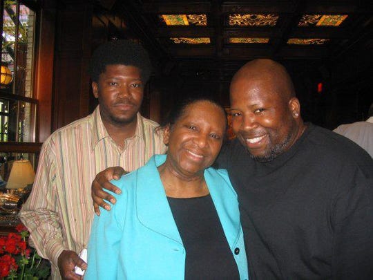 Jeanette Nelson, center with her two sons, George Everett Nelson, left, and Duane Nelson, right.