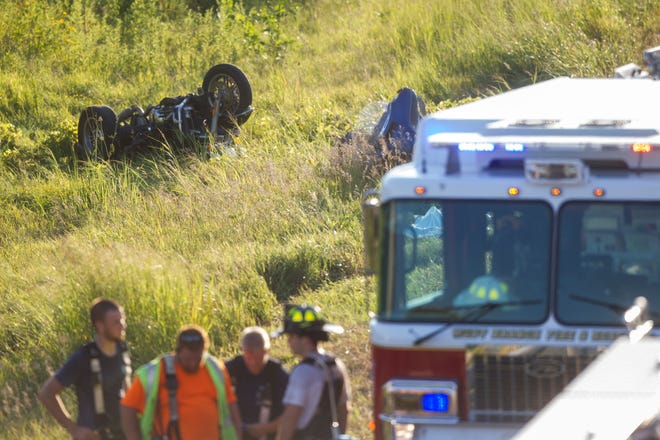 Emergency crews respond to a crash between a motorcycle and a semi on Wednesday, Aug. 8, 2018, along Interstate 80 before the X16 overpass, in Johnson County, Iowa. 