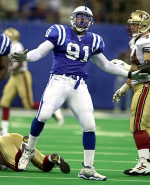 Colts defensive end Chukie Nwokorie celebrates after sacking San Francisco quarterback Jeff Garcia in the third quarter of a 40-21 loss to the San Francisco 49ers at the RCA Dome in 2001.