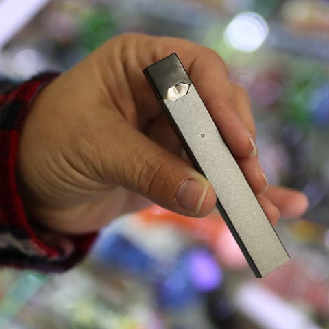 The sleek JUUL e-cigarette looks like a memory sti