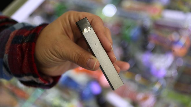 The sleek JUUL e-cigarette looks like a memory stick.