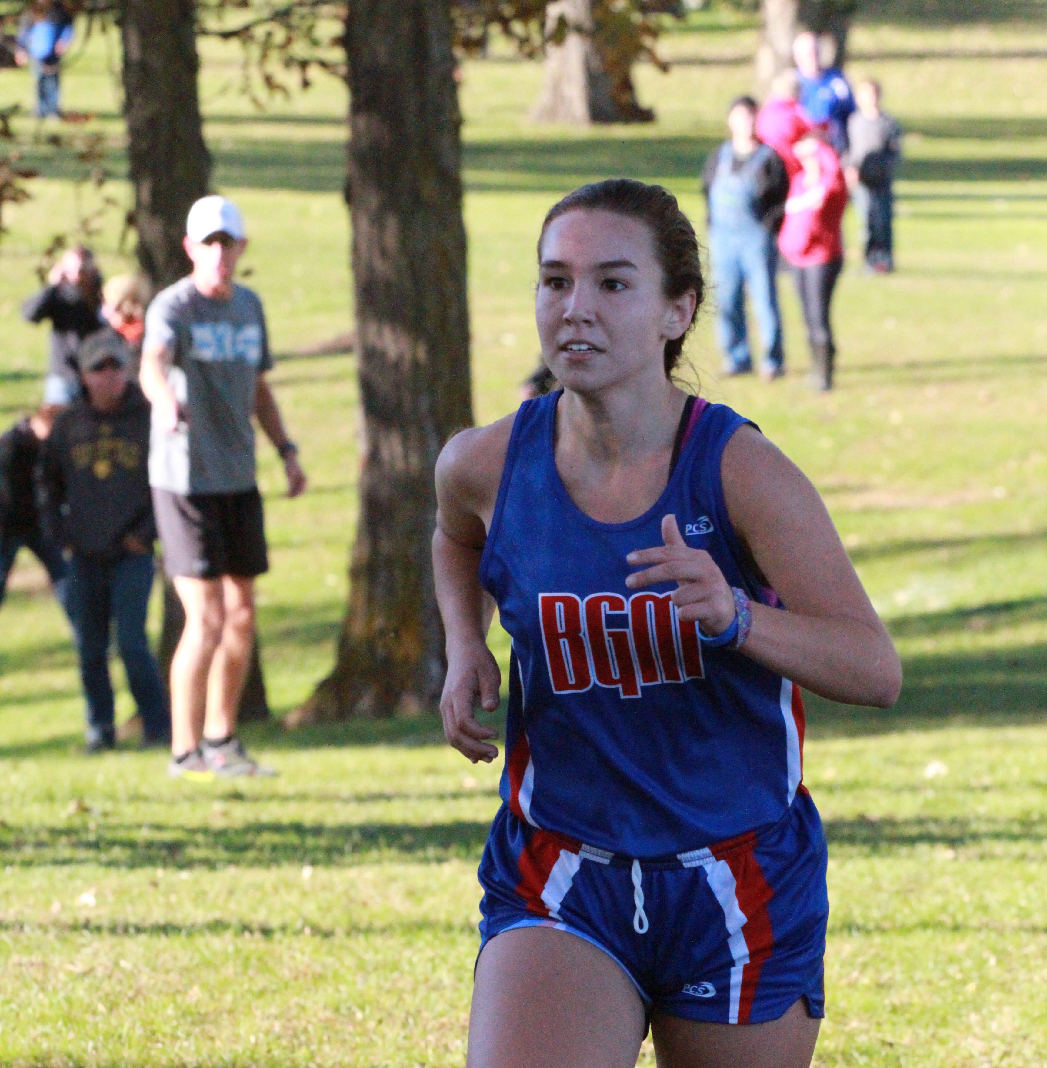 Mollie Tibbetts of BGM heads to the finish line with a 25:52.1 to lead the Bears to third place at the South Iowa Cedar League cross country meet.