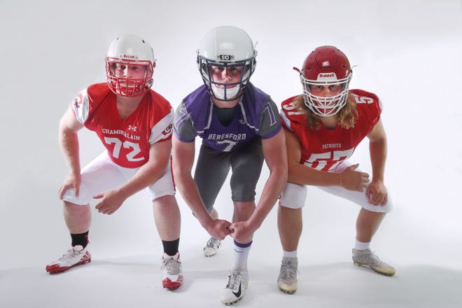Chamberlain lineman Nash Hutmacher, from left, Beresford lineman Blake Peterson and Lincoln lineman Grant Treiber during football media day Tuesday, Aug 7, at Argus Leader Media in Sioux Falls.