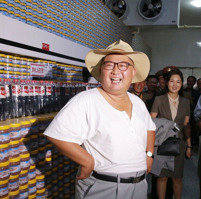 This undated picture released by North Korea's official Korean Central News Agency (KCNA) on August 8, 2018, shows North Korean leader Kim Jong Un  inspecting the Kumsanpho Fish Pickling Factory in North Korea.