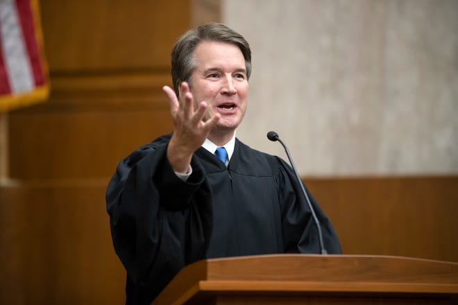 President Donald Trump's Supreme Court nominee, Judge Brett Kavanaugh, speaks as he officiates at the swearing-in of Judge Britt Grant to take a seat on the U.S. Court of Appeals for the 11th Circuit on Tuesday, Aug. 7.