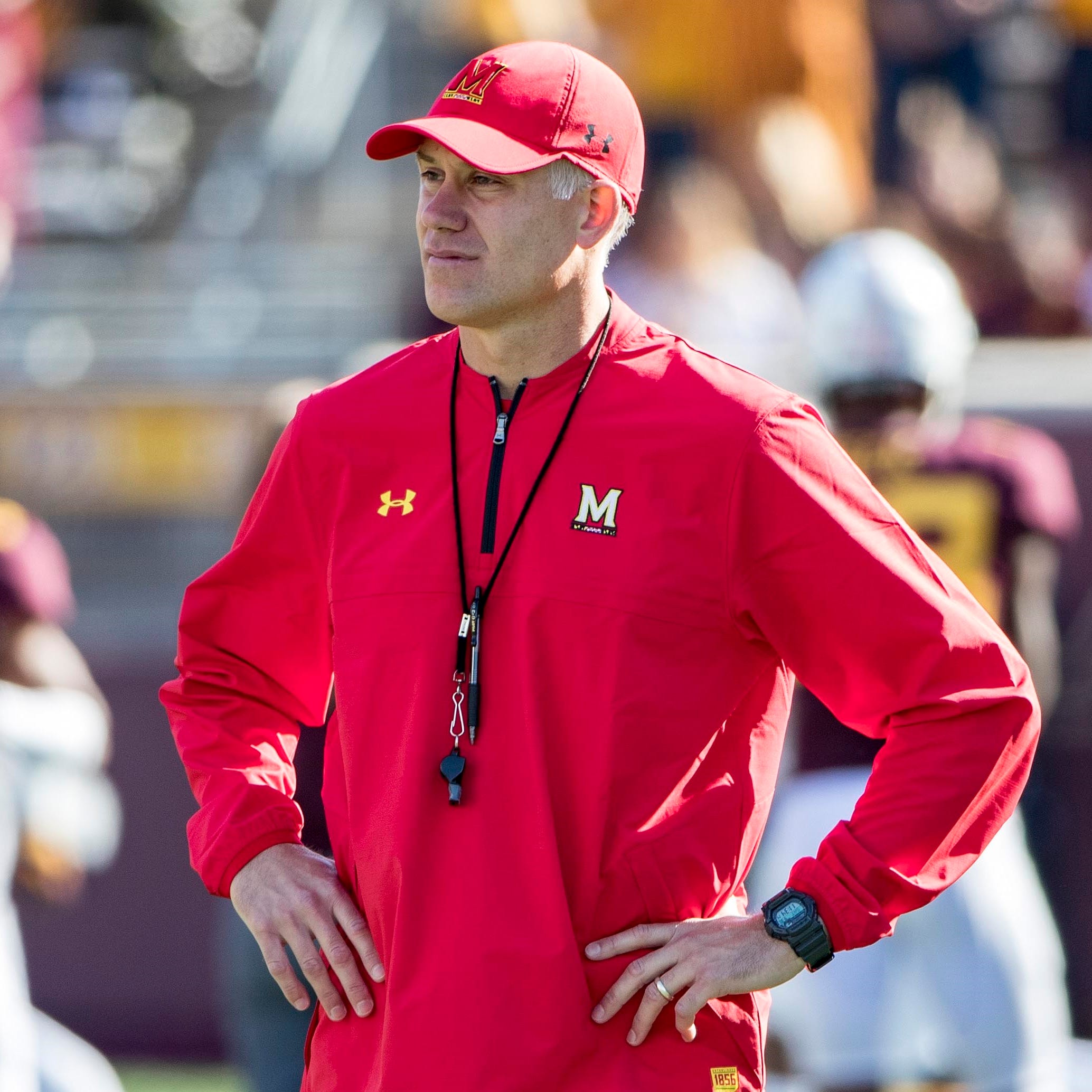 Maryland coach DJ Durkin stands on the sideline before his team's game against Minnesota.