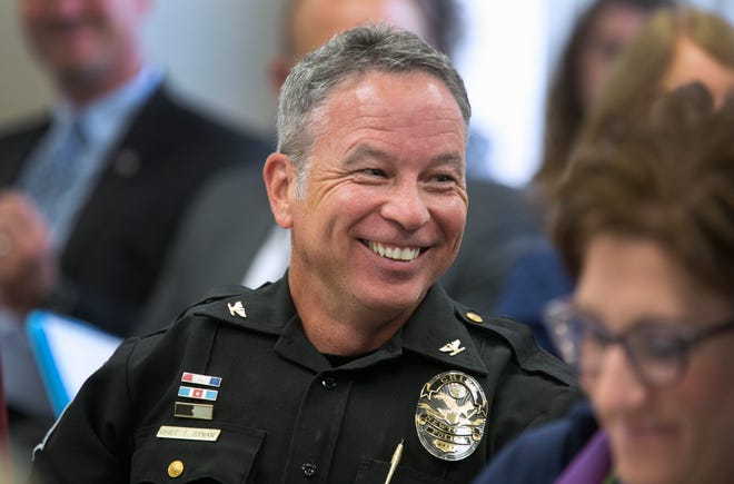 Newtown Police Chief Tom Synan attends a Hamilton County Heroin Coalition meeting in August. He's among the founders of the coalition, which launched in 2015 as a multi-agency organization to fight the opioid epidemic.