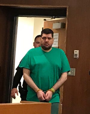 Vito Nigro enters acourtroom in Middlesex County Superior Court