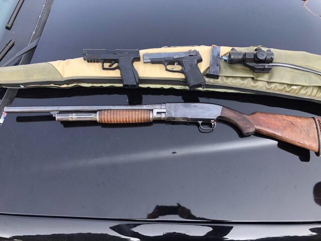 Guns found when police searched the vehicle of Chris Verduzco, 31, who was arrested on suspicion of burglary, gun and drug charges Sunday.