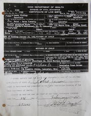 As a baby in 1954 Steve Dennis was abandoned in a telephone booth in Lancaster, Ohio. This photograph shows Dennis's birth certificate from that time.