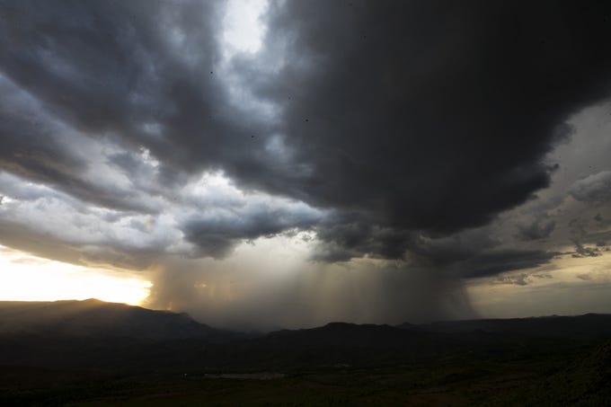 A monsoon storm moves in as seen from the Sunset Point Rest Area outside Black Canyon City on Aug. 13, 2018.