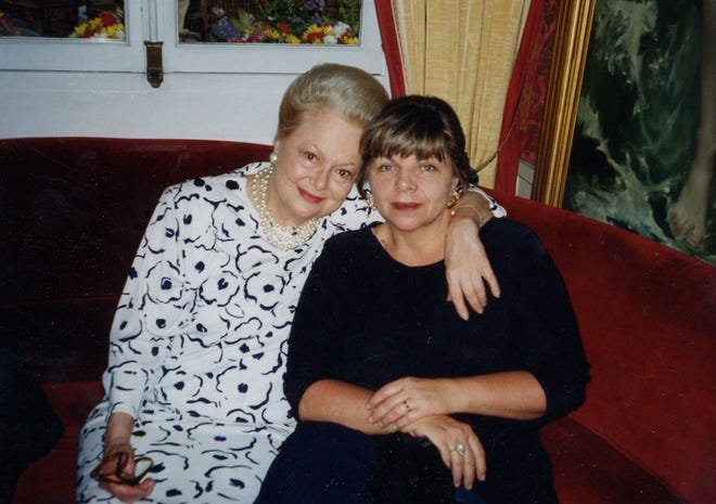 Deborah Potter, right, sits with aunt Olivia de Havilland in Paris in 1996.