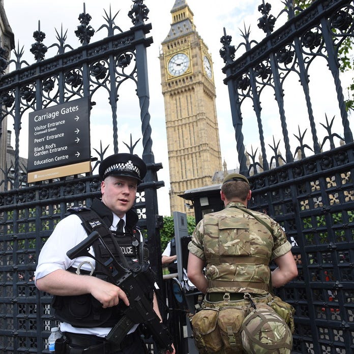 British Army soldiers and police patrol the streets near the Houses of Parliament in London, in May 2017.
