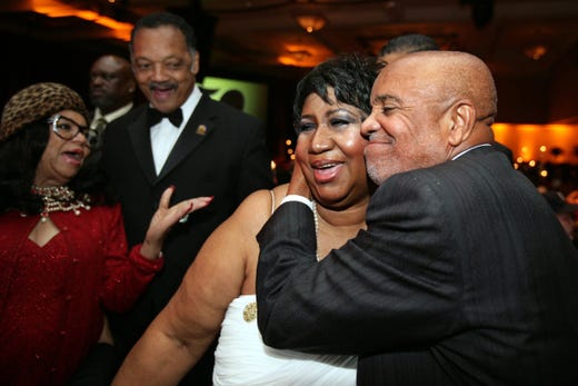 November 2009; Detroit, MI, USA; Berry Gordy hugs Aretha Franklin while Jesse Jackson and a guest looks on at the Motown 50 Golden Gala Live it Again Weekend at the Marriott in the Renaissance Center in Detroit. Mandatory Credit: Kimberly P. Mitchell /Detroit Free Press via USA TODAY NETWORK ORIG FILE ID: 20180812_ajw_usa_058.jpg