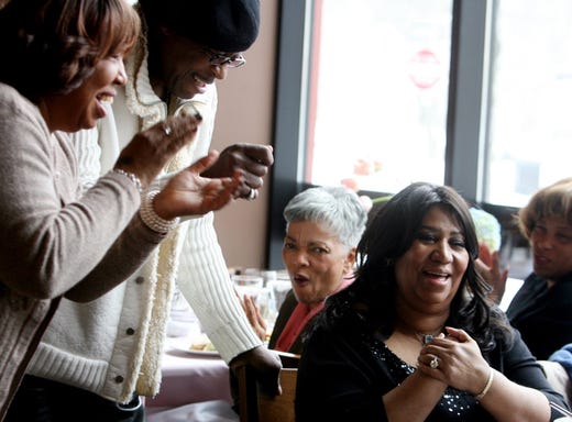 February 26, 2010; Detroit, MI, USA; Aretha Franklin hosts a high tea listening party at the Detroit Fish Market for her soon-to-be released CD, "A Woman Falling Out of Love." As the songs play her sister-in-law Earline Franklin of Detroit, left and friend Ali Woodson a former lead singer with the Temptations of Los Angeles get up to sing and clap and show their enthusiasm for the new CD. Mandatory Credit: Regina H. Boone/Detroit Free Press via USA TODAY NETWORK ORIG FILE ID: 20180812_ajw_usa_059.jpg