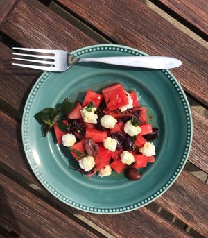 Watermelon, olives and feta team up in this summery salad.