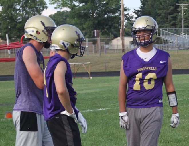 Fowlerville's JT Maybee (right) is one of the top receivers and defensive players in Livingston County.