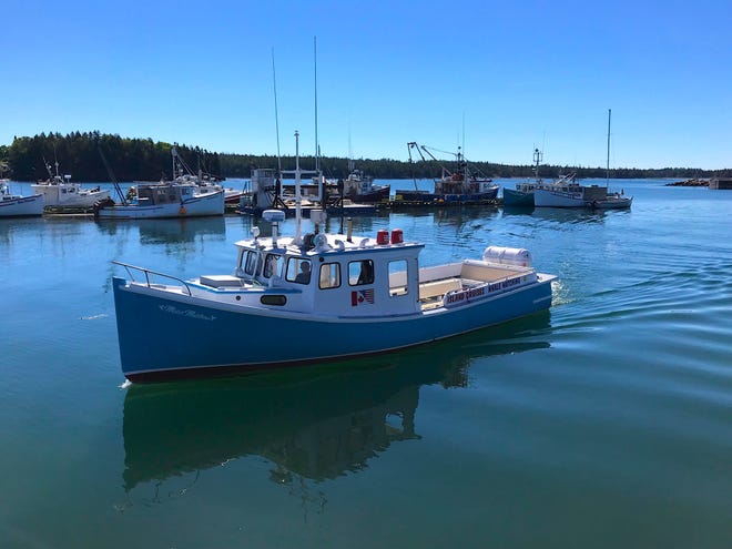 Boat captain Mackie Greene prepares to transport guests from Back Bay to Campobello Island. On the crossing, it’s not uncommon to spot minke whales, porpoises and occasionally a rare North Atlantic right whale.