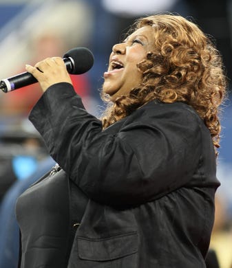 (FILES) In this file photo taken on August 27, 2007 Singer Aretha Franklin performs during a ceremony honoring the late African-American tennis player Althea Gibson at the US Open in Flushing Meadows, New York. - Aretha Franklin died at the age of 76 on August 16, 2018 at her home in Detroit according to her publicist. (Photo by Don EMMERT / AFP)DON EMMERT/AFP/Getty Images ORIG FILE ID: AFP_18C7RJ
