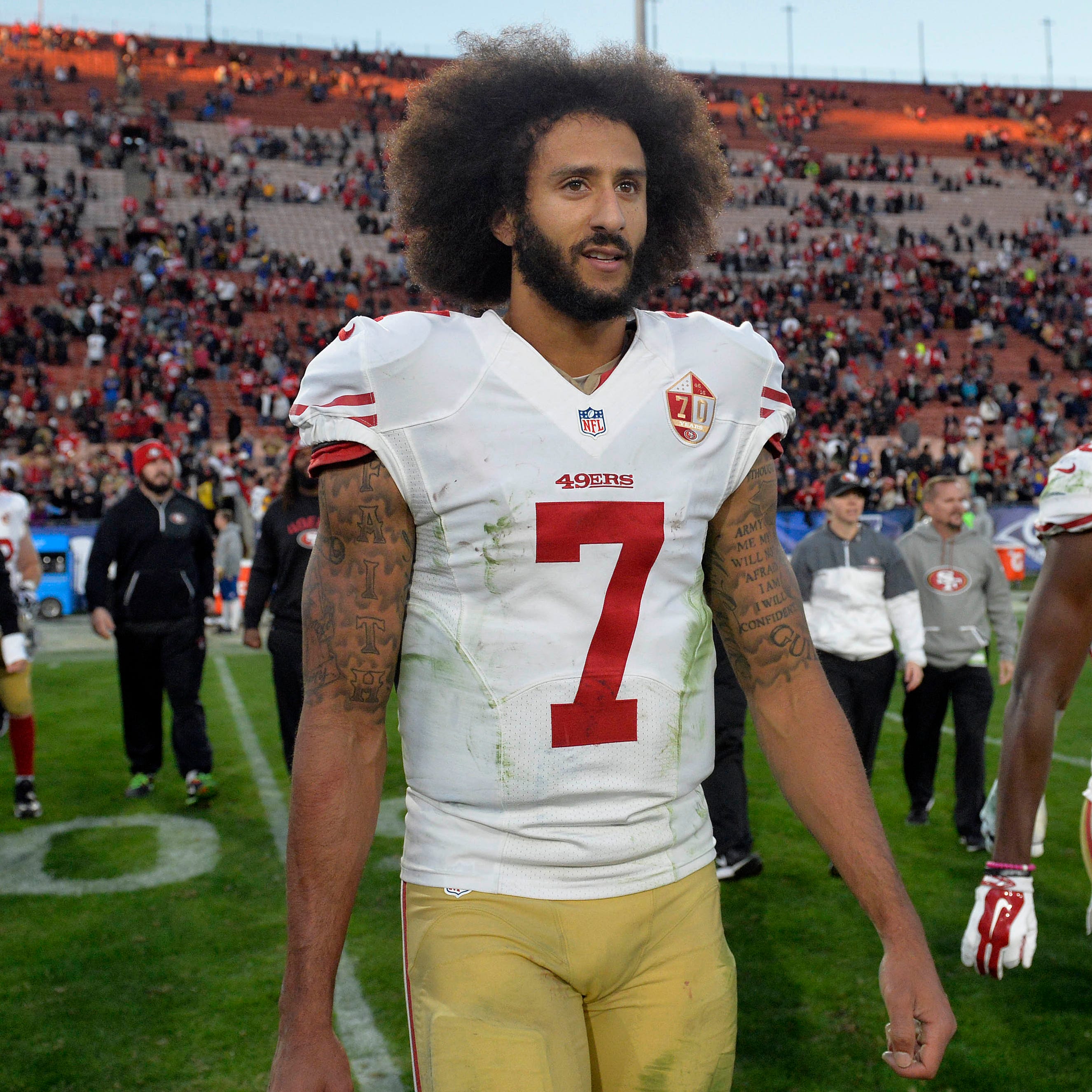 San Francisco 49ers quarterback Colin Kaepernick (7) reacts following the 22-21 victory against the Los Angeles Rams at Los Angeles Memorial Coliseum.
