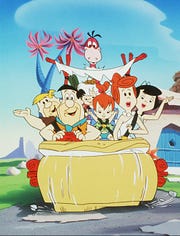 "The Flintstones" debuted in 1960 as a modern stone-age family in the town of Bedrock. The Hanna-Barbera cartoon spent six seasons on ABC with Fred and his family dealing with a dinosaur as a pet and a car driven by their own feet.