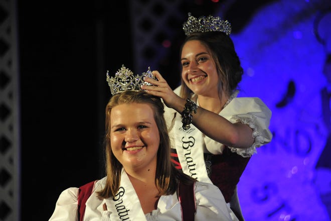 Emily Rudd smiles as the 2018 Bucyrus Bratwurst Festival Queen's tiara is placed on her head by outgoing queen Allison Lawson. This year's queen's pageant will start at 8 p.m. Thursday, Aug. 15, on the Rensselaer Stage.