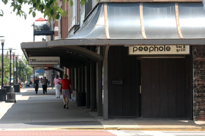 The Peephole Bar & Grill sits on the corner of Main street and S.E. Second Street in Downtown Evansville recently.
