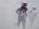Alcoa's Itty Salter (34) emerges from the fog for the start of the football game against Grace Christian Academy on Thursday, August 16, 2018.