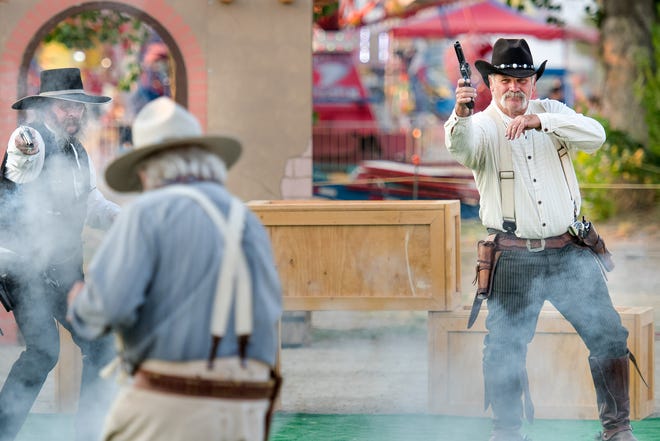 Nevada Gunfighters perform a skit called "Poker Game that Went Wrong."