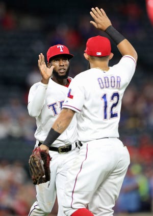 Jurickson Profar and Rougned Odor turned a triple play and helped the Rangers rally for a win.