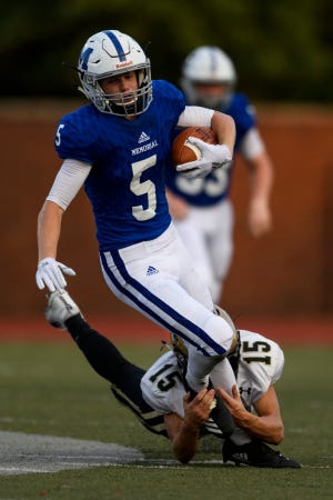 Memorial's Dawson Hurley (5) caught two touchdown passes in the Tigers' romp over Harrison.