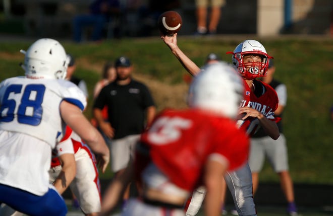 Glendale quarterback Blaine Huston throws a pass during a jamboree game against Marshfield at Glendale on Friday, August 17, 2018