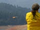 In the northeast section by Bollibokka Club along McCloud River on Saturday, Aug. 18, 2018 a helicopter drops water on a hot spot on the ridge. Helicopters have been collecting water from Lake Shasta at Hirz Bay area to drop on the fire. (Special to the Record Searchlight photo by Hung T. Vu)