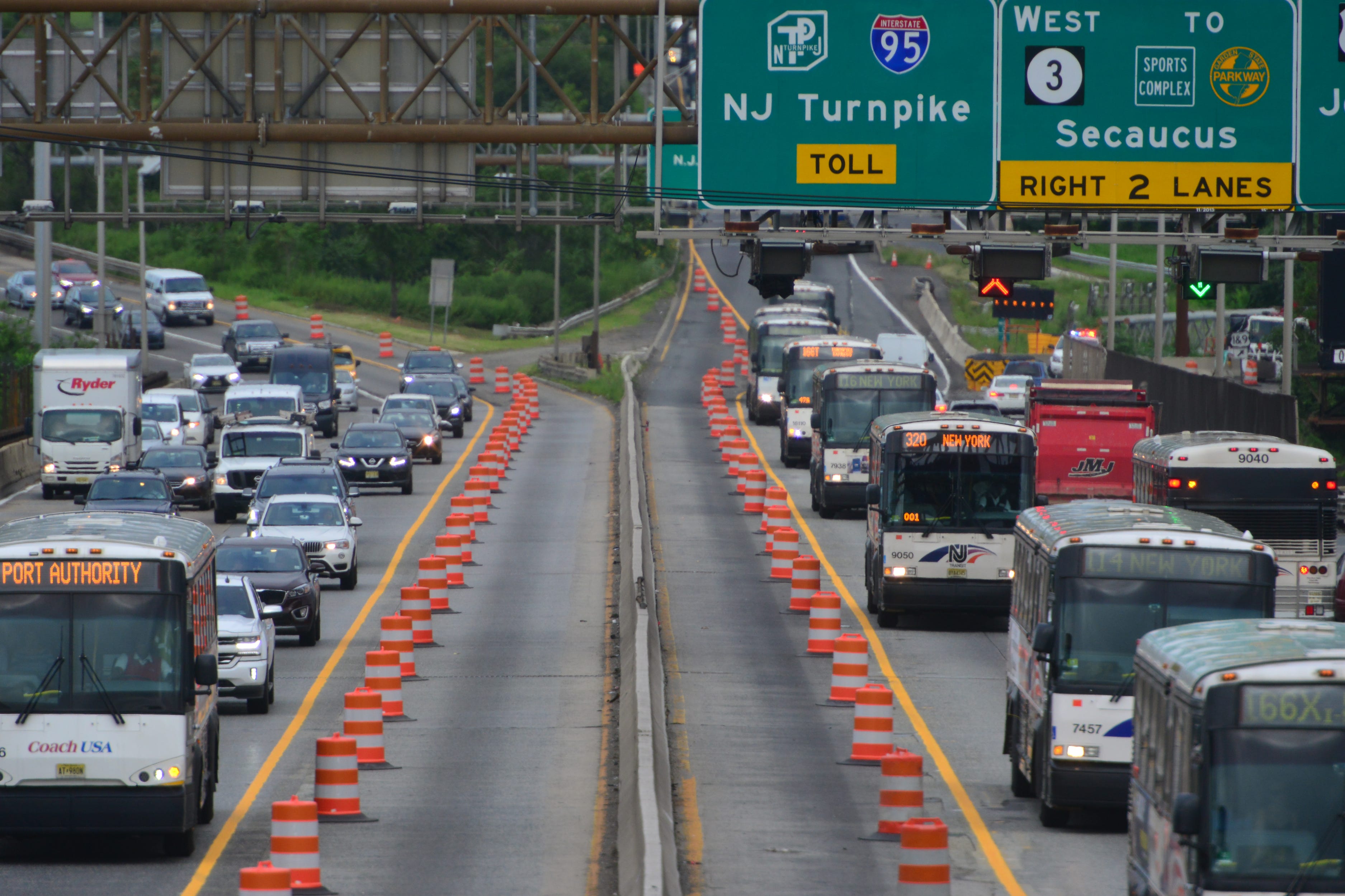 A line of buses can be seen heading to the Lincoln Tunnel en route to the Port Authority Bus Terminal during construction on the Route 495 bridge in North Bergen. Aug. 20, 2018.