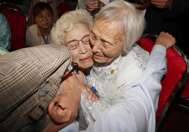 South Korean Cho Hye-do, 86, left, hugs her North Korean sister Cho Sun Do, 89, during the Separated Family Reunion Meeting at the Diamond Mountain resort in North Korea. Dozens of elderly South Koreans crossed the heavily fortified border into North Korea on Monday for heart-wrenching meetings with relatives most haven't seen for decades.