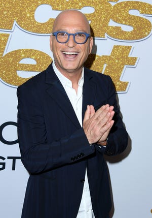 'America's Got Talent' judge Howie Mandel poses on the red carpet after the first live show of the season on Aug. 14 at the Dolby Theatre in Los Angeles.