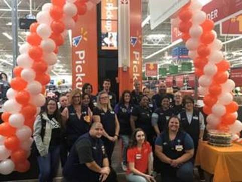 Employees at the Deptford Walmart welcome the arrival of the pickup tower. It's just the second store in the state to get the convenience-oriented feature.